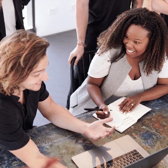 1 Two women talking at a table